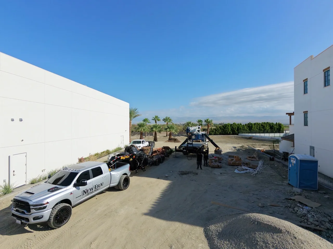 New Era Palms truck and trailer carrying palms at Thermal Racetrack in Thermal, California